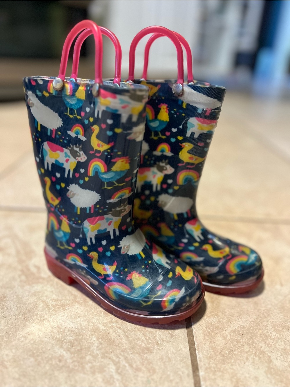 Western Chief Navy Kids Rain Boots with Pink Handles and Multicolor Animal Print